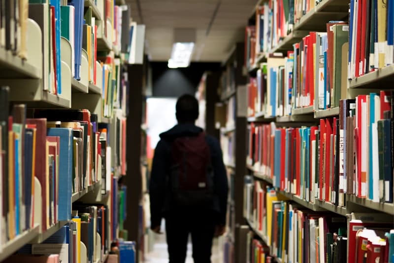 A student getting one-to-one support from a tutor at A Plus Academy