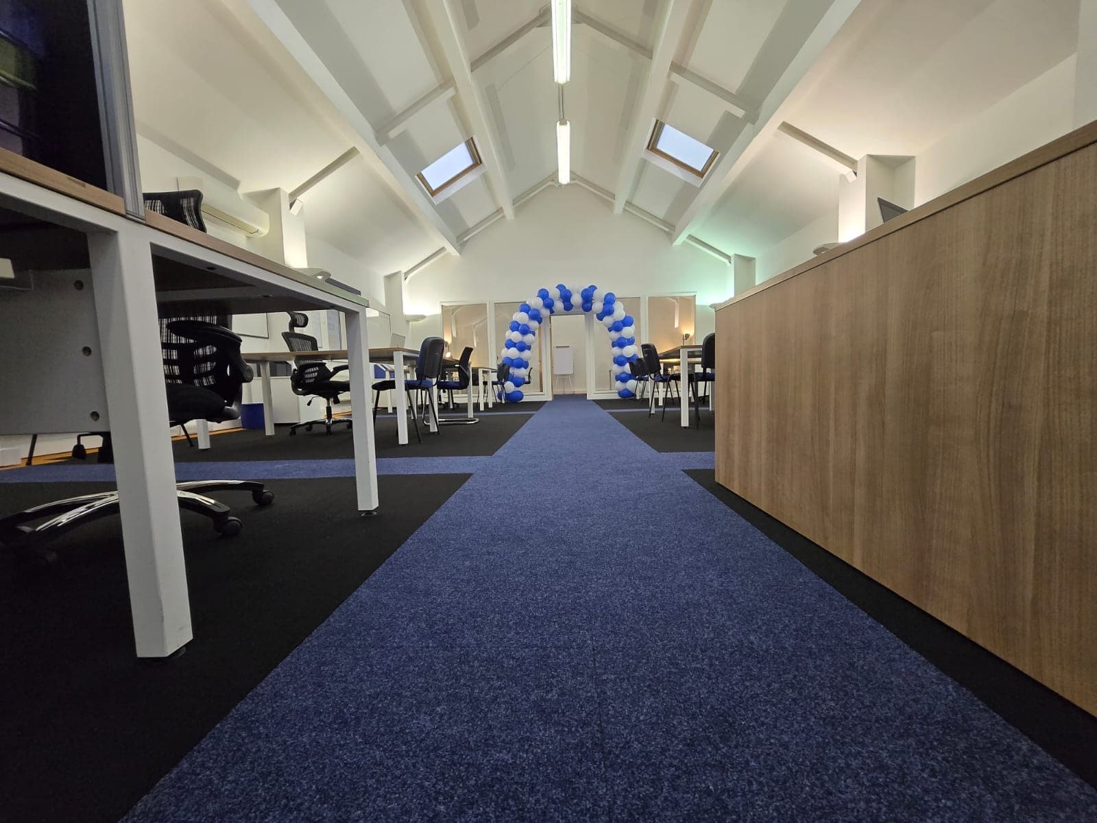 Main classroom at the Cheadle centre with desks under skylights